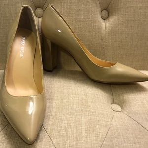 Nude patent shoes